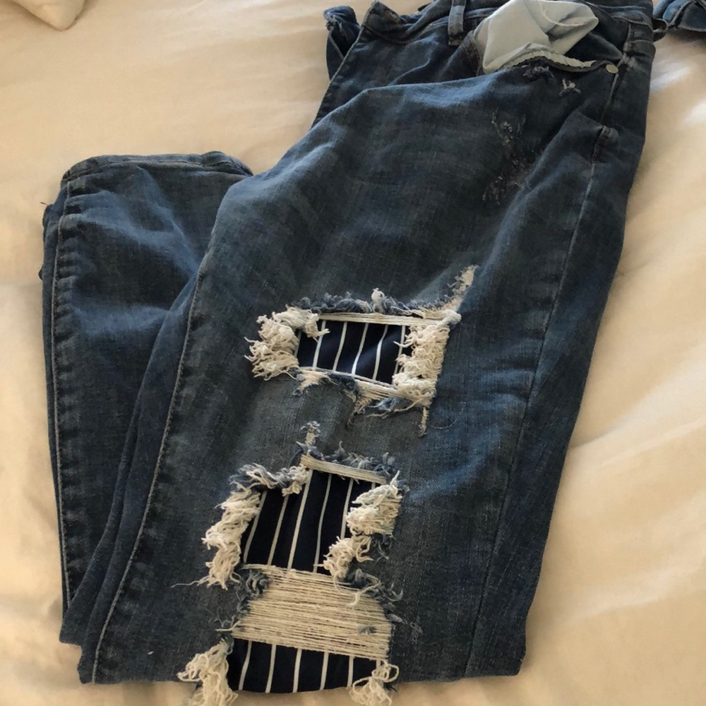 Judy Blue distressed jeans with stripped inserts!